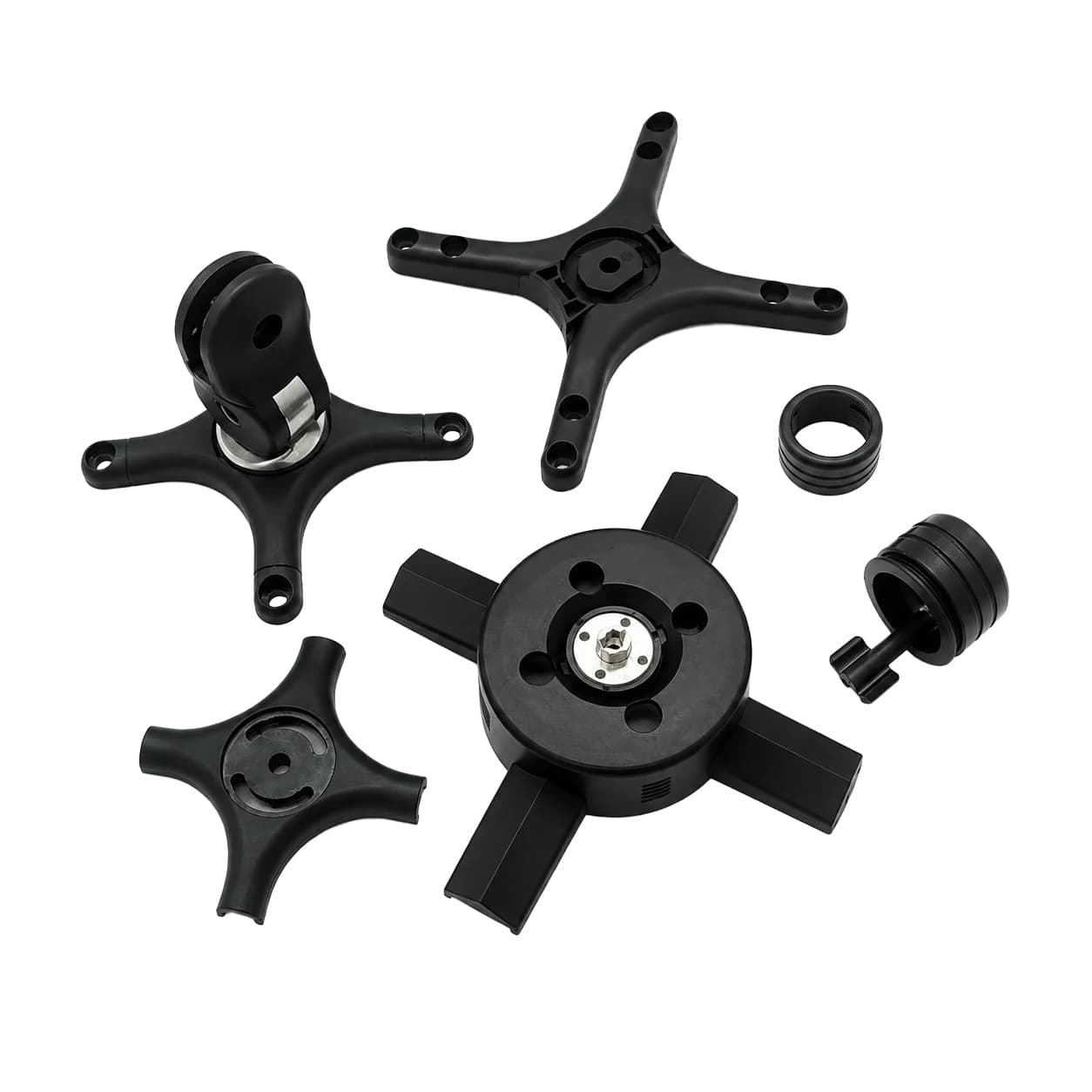 Black plastic structural component sample set on a white background